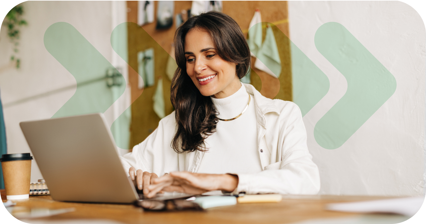Business consultant working on laptop at desk